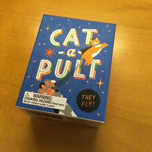 Cat-a-pult toy and book
